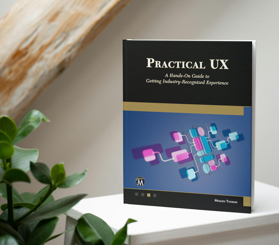 Practical UX Book standing on a shelf